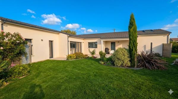 Maison  6 pièce(s)  3 chambre(s)  128 m²