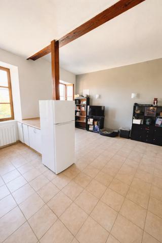 Couzon-au-Mont-d'Or (69270) F2 immeuble en pierre avec balcon