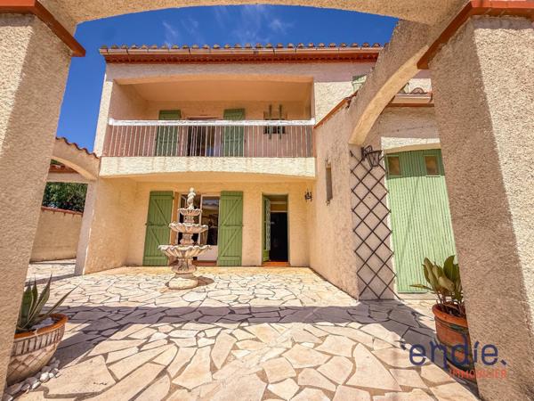 Villa 3 faces avec jardin, garage et 4 chambres