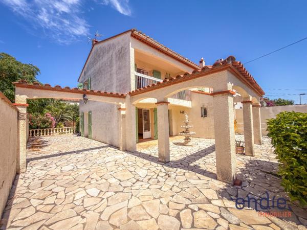 Villa 3 faces avec jardin, garage et 4 chambres