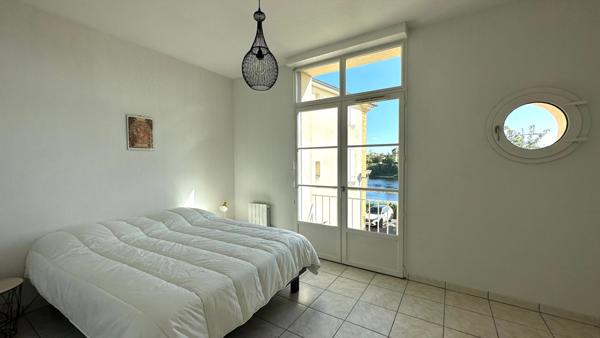 Dpt Dordogne (24), à louer BERGERAC Appartement meublé T3 56 m2, 2 chambres, résidence sécurisée, place de parking privée avec vue sur la Dordogne