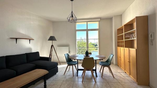 Dpt Dordogne (24), à louer BERGERAC Appartement meublé T3 56 m2, 2 chambres, résidence sécurisée, place de parking privée avec vue sur la Dordogne