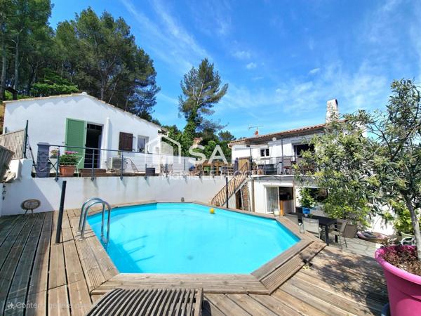 Maison 170 m² divisée en 2 logements + studio – Terrain 965 m² avec piscine