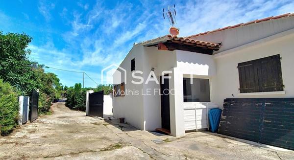 Maison 170 m² divisée en 2 logements + studio – Terrain 965 m² avec piscine