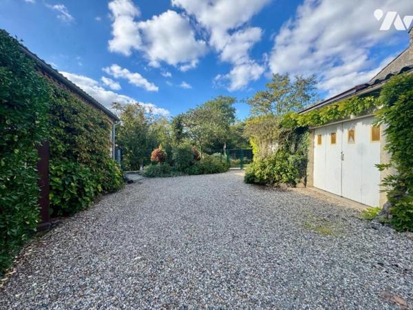 Au calme d'un hameau, habitation avec garage et jardin
