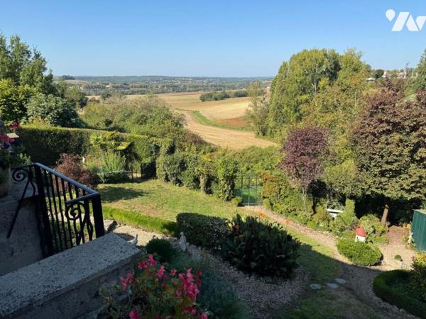 Au calme d'un hameau, habitation avec garage et jardin