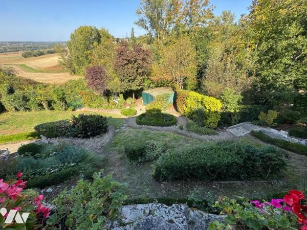 Au calme d'un hameau, habitation avec garage et jardin