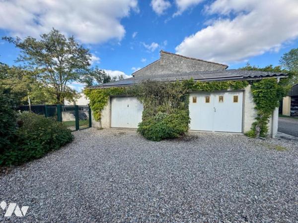 Au calme d'un hameau, habitation avec garage et jardin