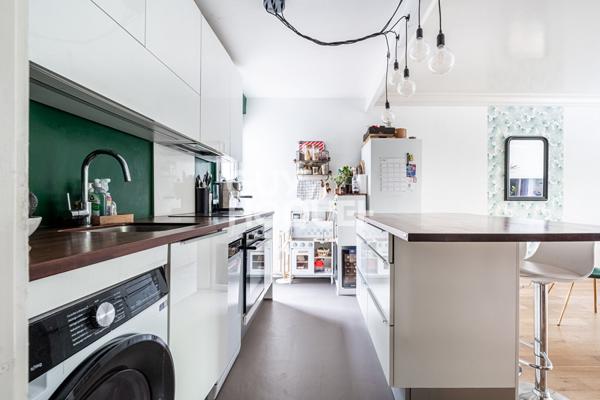 APPARTEMENT 3 PIECES AVEC JARDIN, PARKING ET CAVE