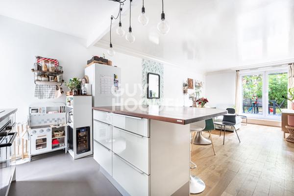 APPARTEMENT 3 PIECES AVEC JARDIN, PARKING ET CAVE