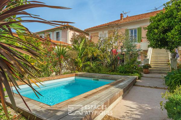 Maison en plein centre ville avec jardin et piscine