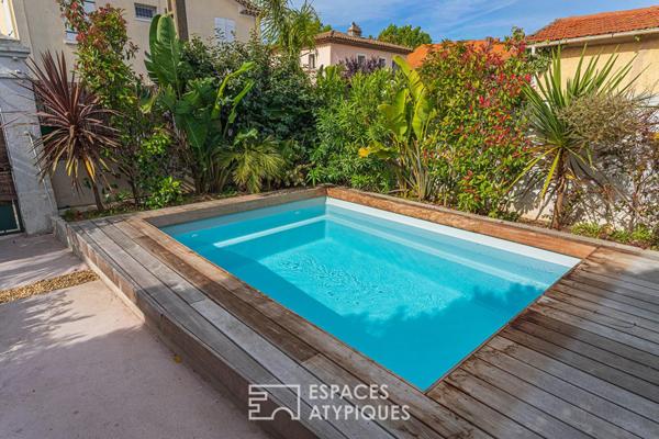Maison en plein centre ville avec jardin et piscine