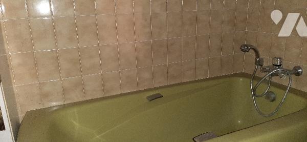 Maison de ville  comprenant garage, cellier, 4 chambres, SAM, cuisine aménagée, salon jardin