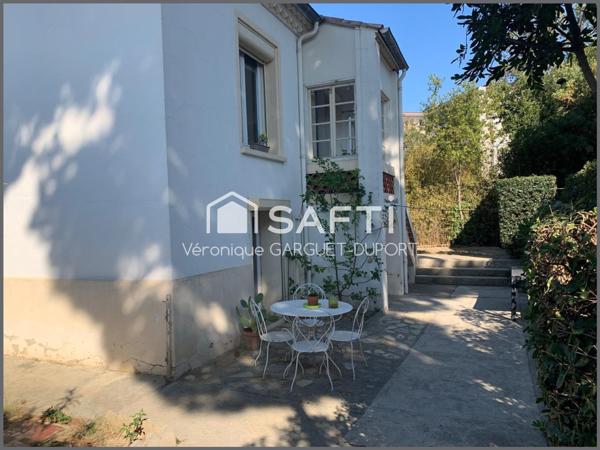 Maison familiale, 5 chambres, jardin, garage en ville