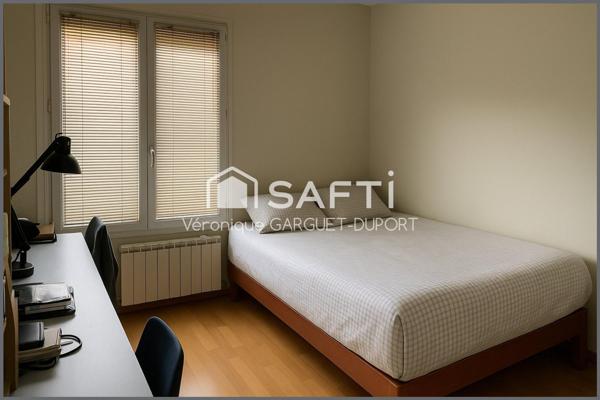 Maison familiale, 5 chambres, jardin, garage en ville