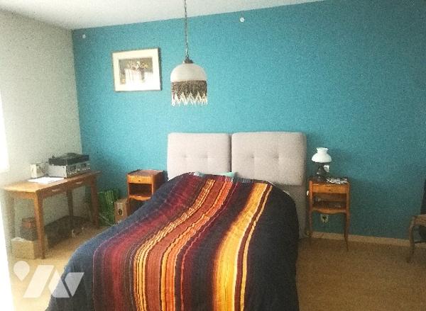 En centre-ville, proche des commerces, maison avec garage, terrasse et jardin orienté sud