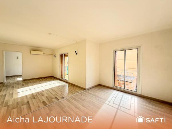 Appartement 63m2, 2/3 chambres, Balcon et cave.