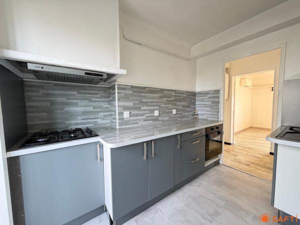 Appartement 63m2, 2/3 chambres, Balcon et cave.