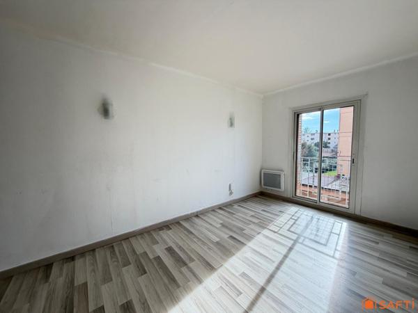 Appartement 63m2, 2/3 chambres, Balcon et cave.