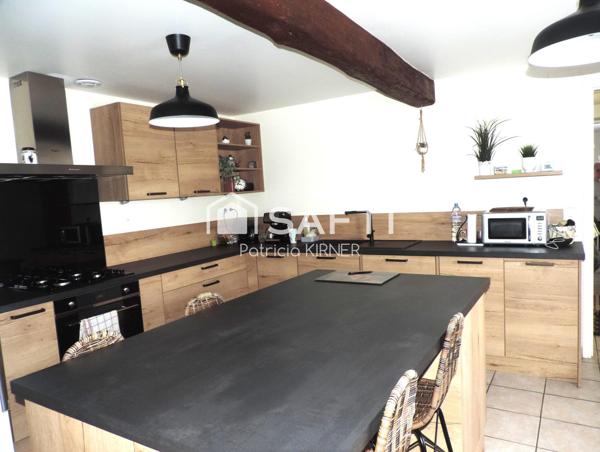 Maison de ville T5 avec garage, jardin et puits.