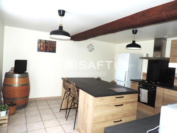 Maison de ville T5 avec garage, jardin et puits.