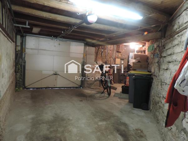 Maison de ville T5 avec garage, jardin et puits.