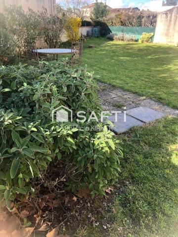 Maison de ville T5 avec garage, jardin et puits.