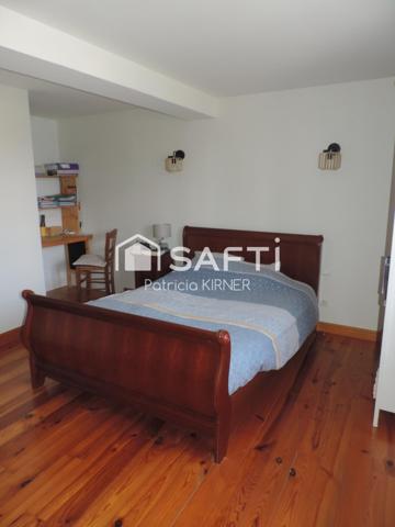 Maison de ville T5 avec garage, jardin et puits.