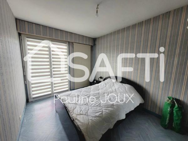 Appartement 2 pièces avec garage et cave, loué