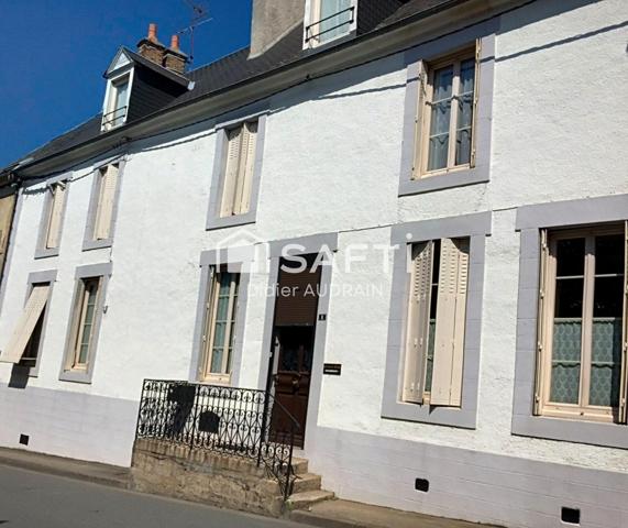 Majestueuse maison avec vaste terrain au coeur du village