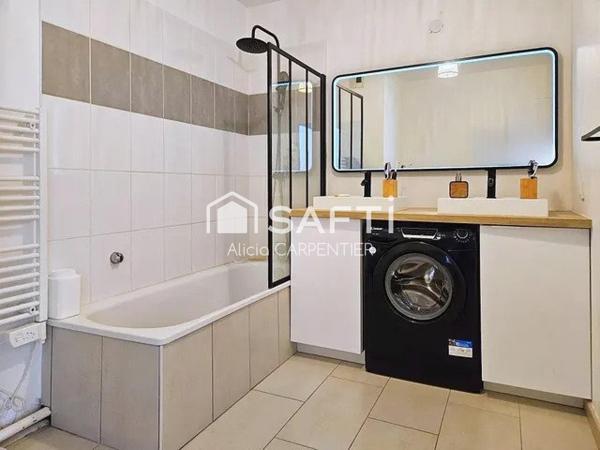 Appartement entièrement rénové avec une place de parking privative en sous-sol