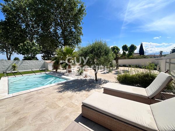 Maison d'Exception à Vendre à Théza - Un Havre de Paix et de Confort