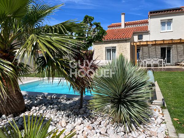 Maison d'Exception à Vendre à Théza - Un Havre de Paix et de Confort
