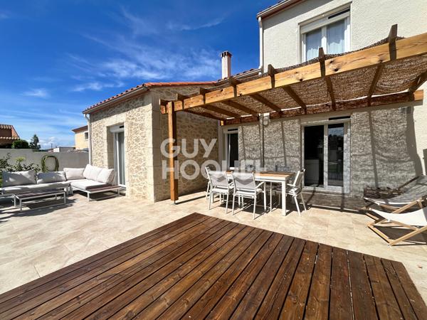 Maison d'Exception à Vendre à Théza - Un Havre de Paix et de Confort