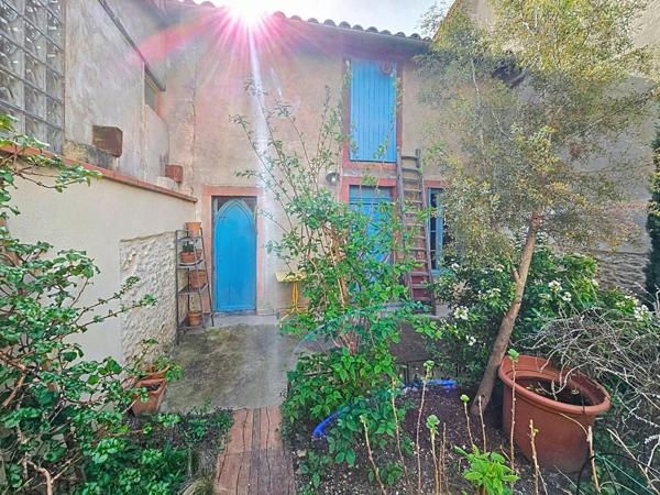 Maison bourgeoise rénovée avec garage et jardin