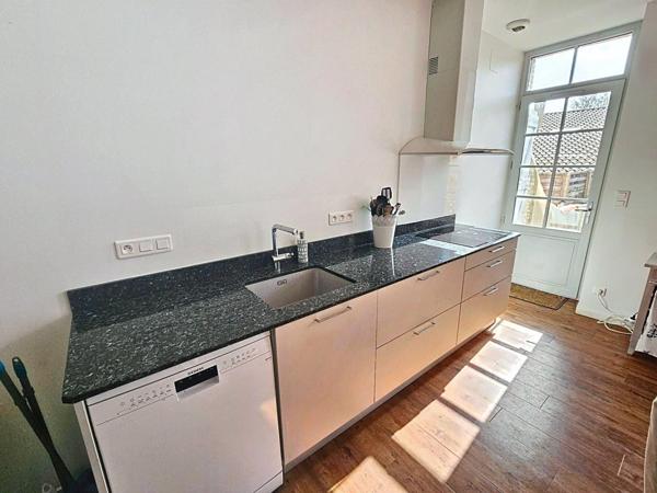 Maison bourgeoise rénovée avec garage et jardin