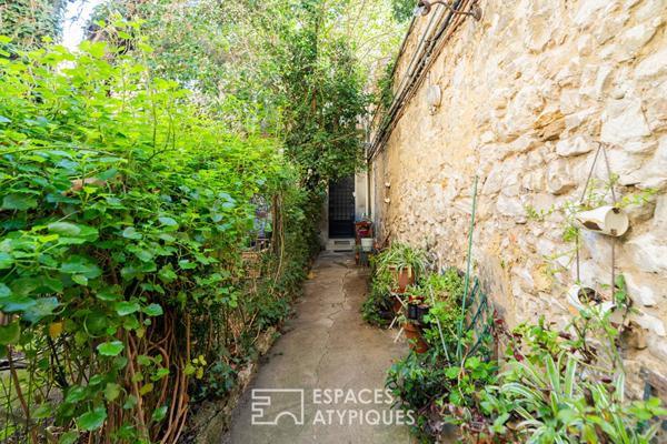 Appartement avec accès toit-terrasse en fond de cour