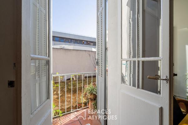 Appartement avec accès toit-terrasse en fond de cour