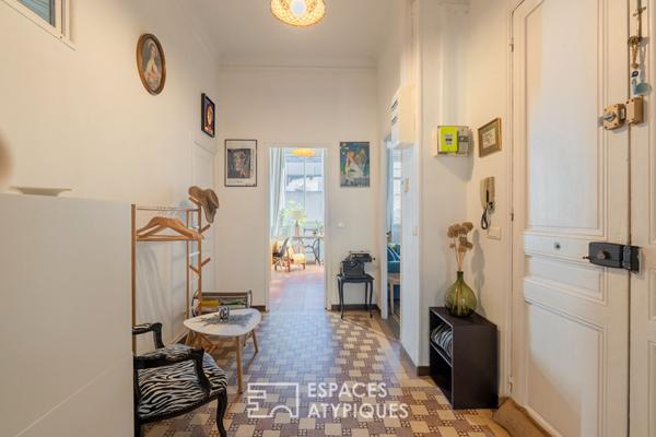 Appartement avec accès toit-terrasse en fond de cour