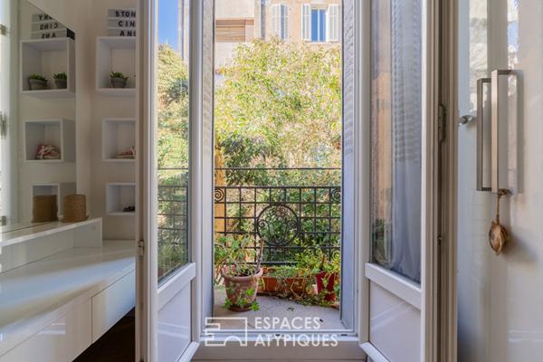 Appartement avec accès toit-terrasse en fond de cour