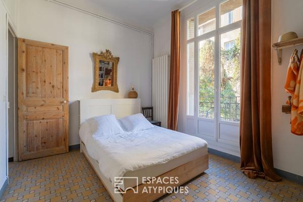 Appartement avec accès toit-terrasse en fond de cour