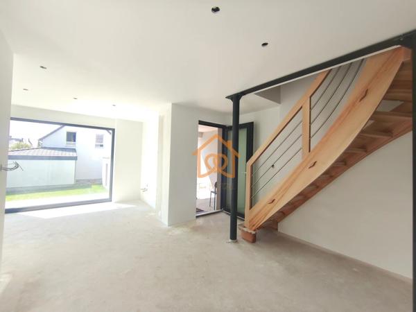 À Geispolsheim Village : Appartement avec garage, parking et un are de terrain