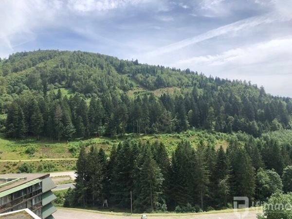 F2 de 52m² Cheminée Véranda Parking privé Dernier étage avec vues