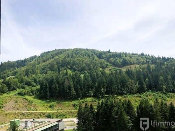 F2 de 52m² Cheminée Véranda Parking privé Dernier étage avec vues