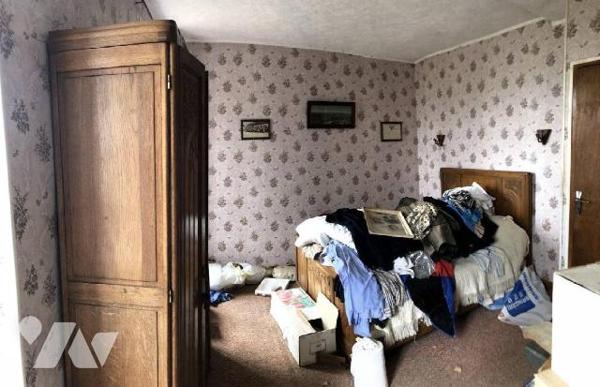 Maison d'habitation comprenant : une entrée, une cuisine, un salon, une salle à manger, une sal...