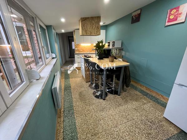 ENSEMBLE IMMOBILIER COMPOSE DE 2 MAISONS SEMI PLAIN PIED ET 2 TERRAINS CONSTRUCTIBLES Wahagnies (59261)