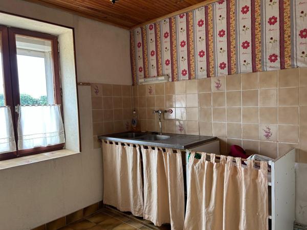 maison en pierre avec terrain