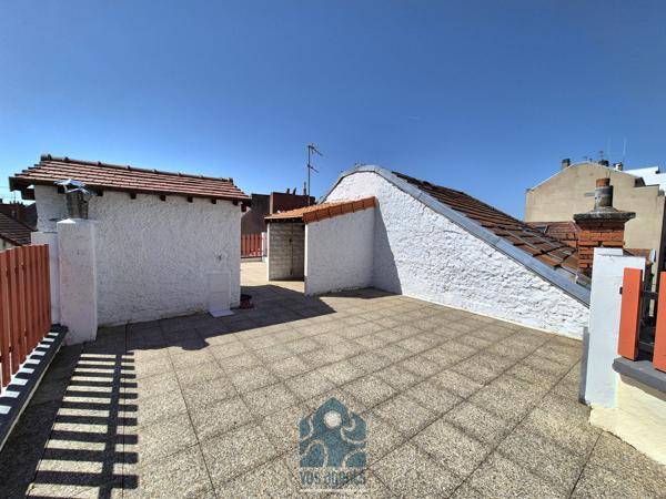 Immeuble de 4 appartements terrasses et caves