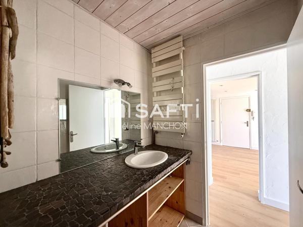 T3 traversant de 68 m2 - Balcons - Garage et cave