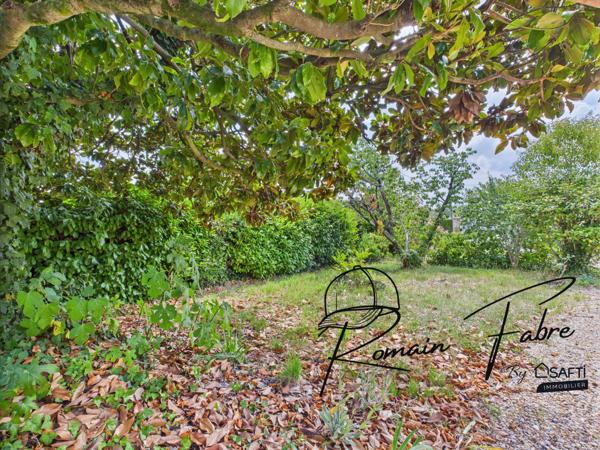 Maison en pierre avec 2 chambres, cadre bucolique et très grand garage